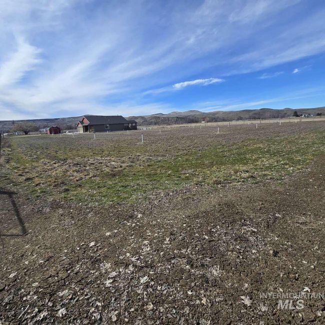 View of yard with a mountain view and a view of rural / pastoral area | Image 31
