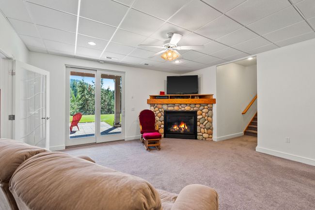Daylight walkout recreation room - exterior access to patio | Image 29
