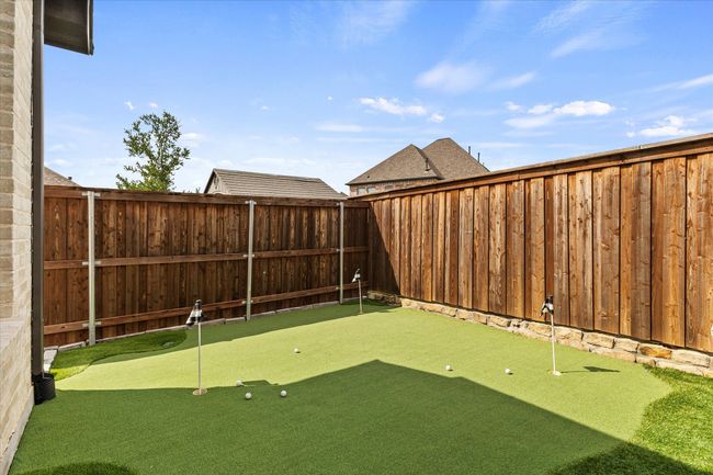 View of yard with a putting green | Image 35