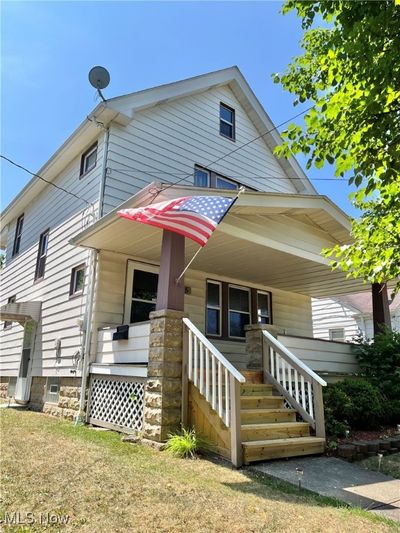 Captivating Colonial in Old Brooklyn ~ 3 Bedrooms, 2 Full Bathrooms, Newer 2 Car Garage, Replacement Windows, Walk up Attic for Storage or Future Living Space, Central Air Conditioning, Built in Microwave, Dishwasher, Gas Range + Refrigerator Stay! | Image 1