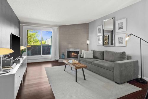 205-1001 68 Ave Sw, Calgary, AB, T2V4X1 | Card Image