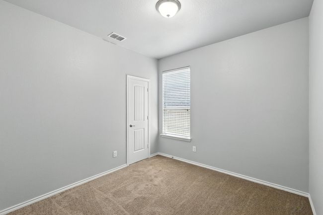Carpeted empty room with baseboards | Image 17