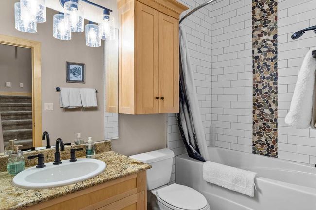 4 - 124 Silvertip Ridge, Home with 4 bedrooms, 3 bathrooms and 4 parking in Canmore AB | Image 26