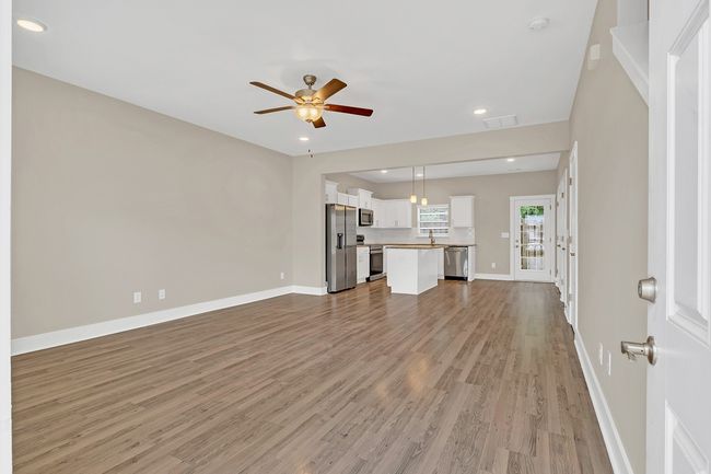 Welcome home! Fresh paint, LVP floors, recessed lighting | Image 5