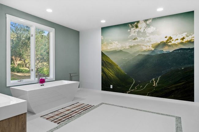 The primary bathroom on the lower level is simply stunning! | Image 19