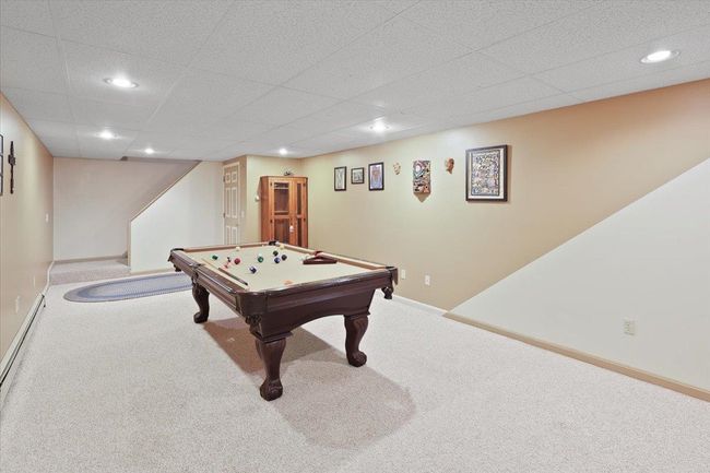 Fantastic bonus space in the basement would make a perfect rec room! | Image 26