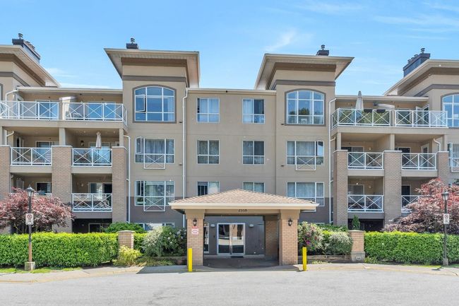 307 - 2558 Parkview Lane, Condo with 1 bedrooms, 1 bathrooms and 1 parking in Port Coquitlam BC | Image 1