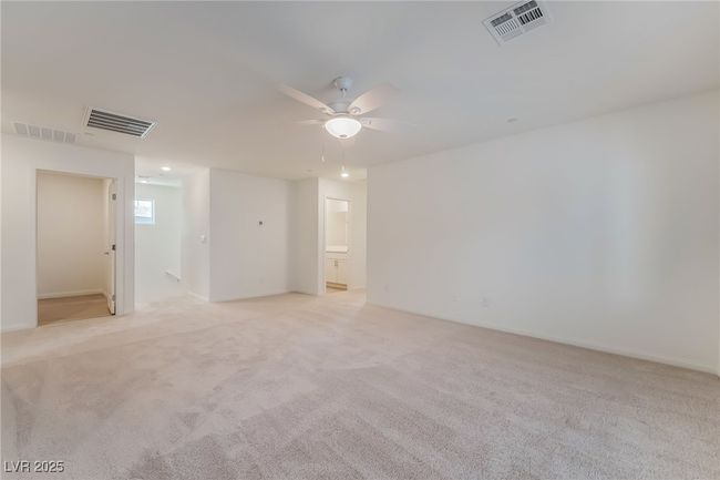Spare room with light carpet and a ceiling fan | Image 18