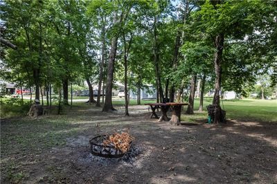 View of community with an outdoor fire pit | Image 2