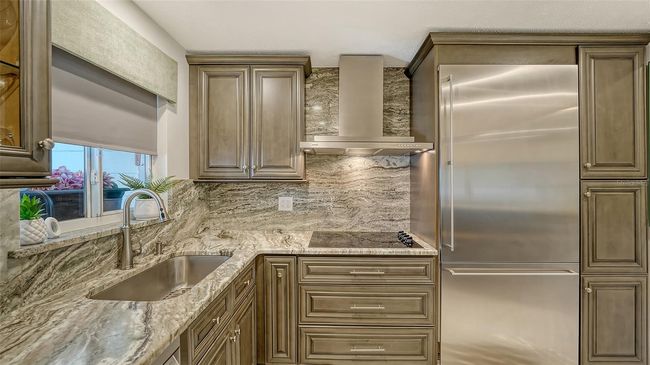 Abundance of cabinetry. | Image 16