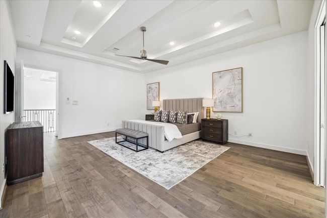 The neutral color palette and minimalist decor create a calming atmosphere, perfect for unwinding after a long day. | Image 31