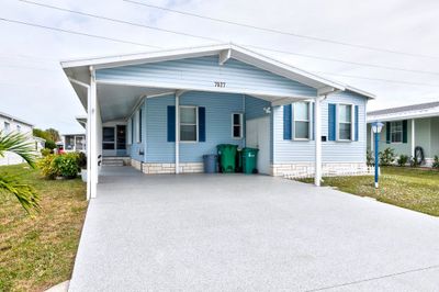 7627 Great Bear Lake Drive, House other with 2 bedrooms, 2 bathrooms and null parking in Micco FL | Image 2