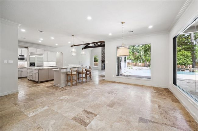 Tons Of Natural Light And Windows Overlooking The Treelined 1 Acre Lot. All New LED Can Lights Throughout The Home. Designer Fixtures and Paint. | Image 9