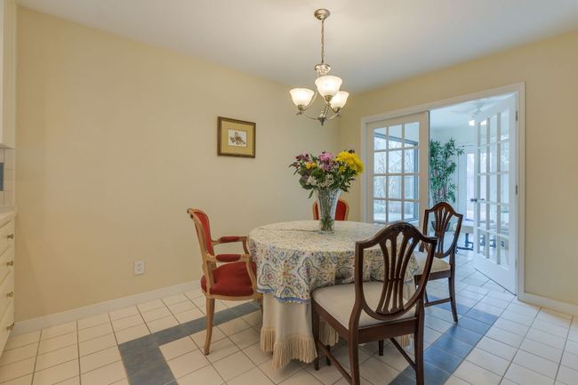 Breakfast area leads to bonus room & outdoor patio | Image 11