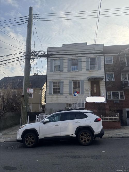 74 44th Ave, Elmhurst, NY, 11373-2923 | Card Image