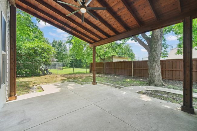 View of patio / terrace with a ceiling fan | Image 34