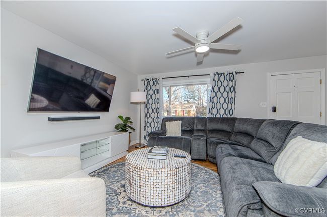 Living room featuring ceiling fan and hardwood / wood-style floors | Image 18