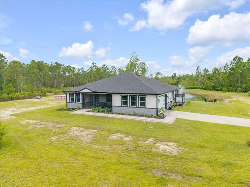 300 Omega Ranch Rd, New Smyrna Beach, FL, 32168-9011 | Card Image