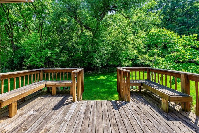 Deck view to wooded area | Image 39