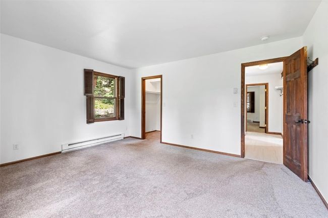 Bedroom 4 - 2 bedrooms on main level off kitchen | Image 34