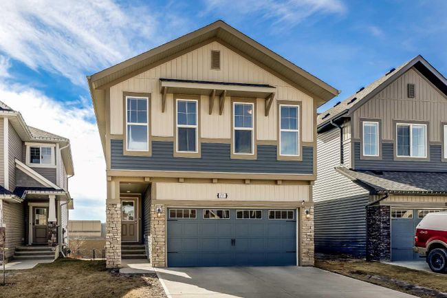 177 Buckskin Way, Home with 4 bedrooms, 3 bathrooms and 4 parking in Cochrane AB | Image 1