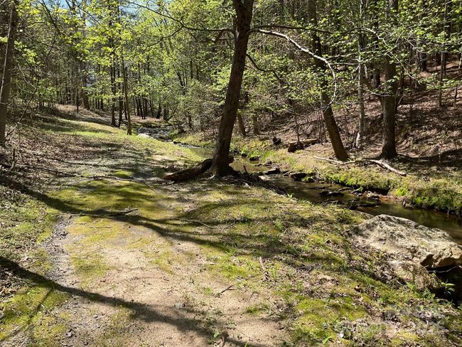Community walking trail a short walk from subject property | Image 11