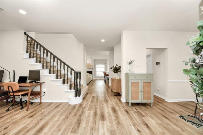 Open the door to fresh design, bright spaces, and effortless comfort—this home makes a statement without even trying. | Image 4
