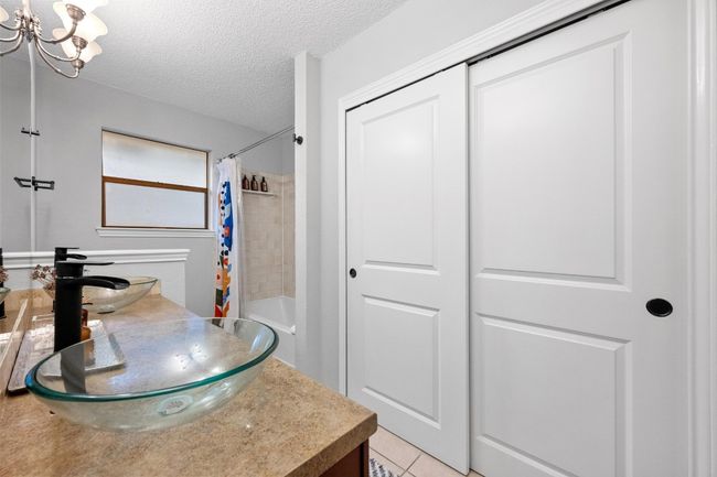 Primary bathroom with dual sinks and two large closets | Image 17