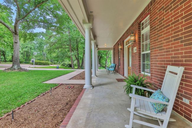 Huge front porch for relaxing, bird watching and entertaining. | Image 5