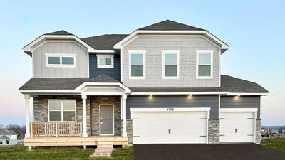 Completed home ready for move in! Driveway, rock edging, and asphalt driveway all included but installed later this year. | Image 1