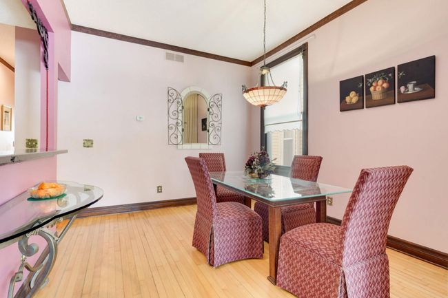 A west-facing window brings light into the dining space, which is large enough to accommodate a table for 6 or 8. | Image 9