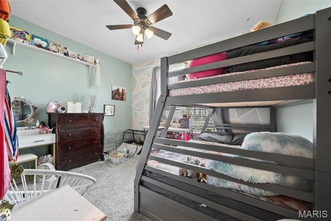 Bedroom with carpet floors | Image 19