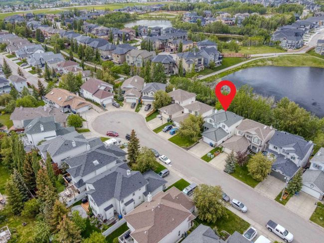 420 Rocky Ridge Cove Nw, Home with 3 bedrooms, 3 bathrooms and 4 parking in Calgary AB | Image 1