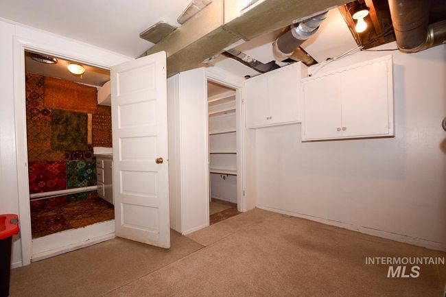 Below grade area featuring light colored carpet | Image 34