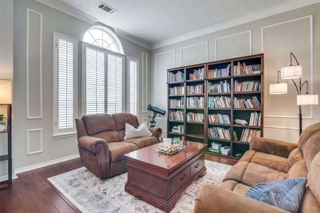 The grand formal living room can be used as a library or an office. | Image 5