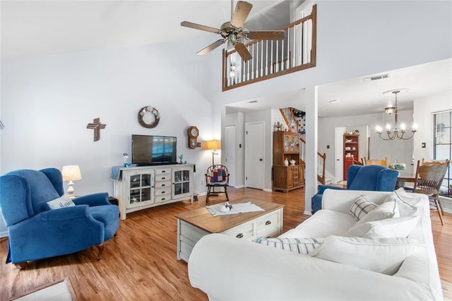 First floor open concept living and dining. | Image 19