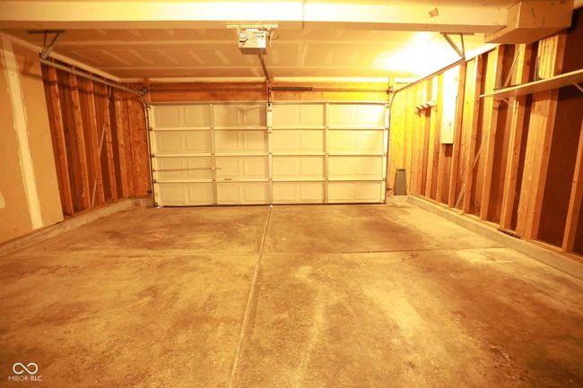 garage featuring a garage door opener | Image 42