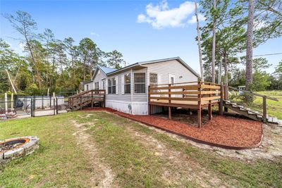 19702 Se 91 St Street, House other with 3 bedrooms, 2 bathrooms and null parking in Ocklawaha FL | Image 3