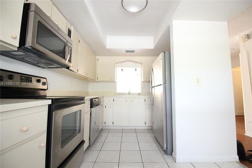 206-8990 W Sample Rd, Coral Springs, FL, 33065-4461 | Card Image