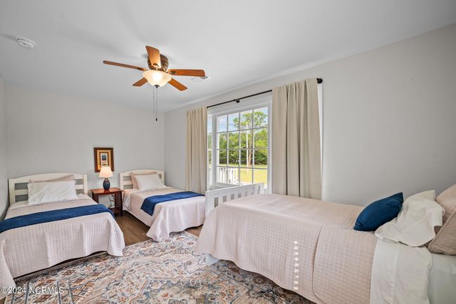 Room for 3 beds or another larger bed in this spacious second bedroom | Image 14