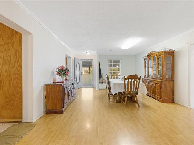 Step past the serene front porch put front inside... | Image 5