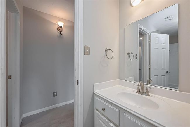 Jack and Jill bathroom with shower tub combo. | Image 33