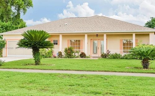 721 Milwaukee Blvd, Lehigh Acres, FL, 33974-9571 | Card Image