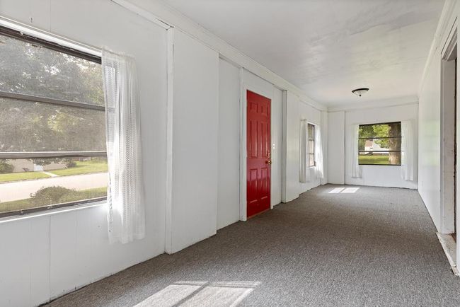 Enclosed porch perfect to greet your guests | Image 22