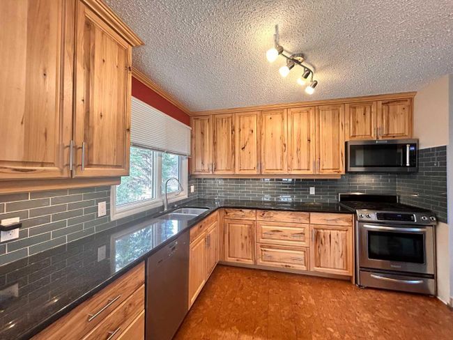 4910 44 Street, Home with 4 bedrooms, 2 bathrooms and 3 parking in Athabasca AB | Image 4
