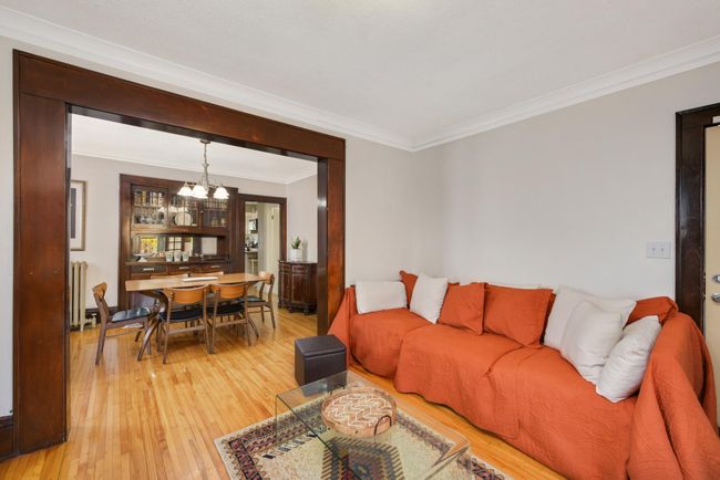 Gorgeous wood floors flow throughout the condo. | Image 6