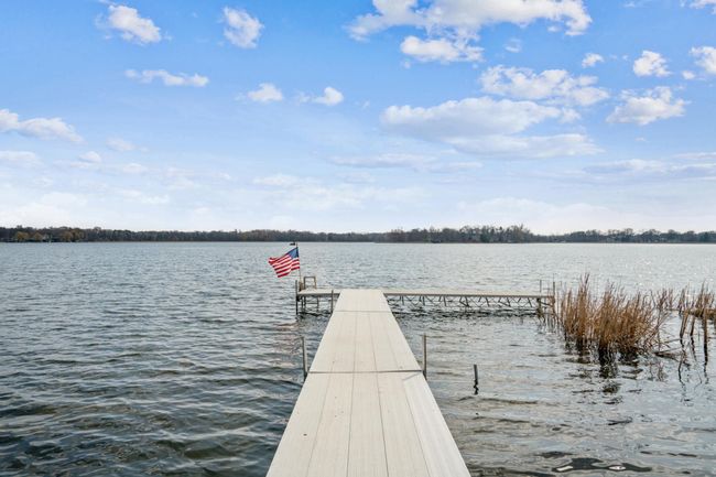 Spacious dock off the 150 feet of pristine shoreline. | Image 39