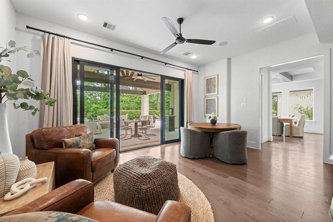 First floor media/gameroom offers slider wall out to the patio. | Image 22