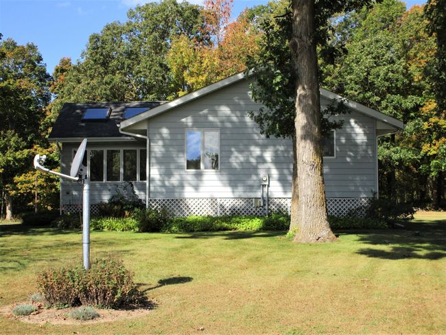 Exterior Side - Shows Skylight In Sunroom | Image 8