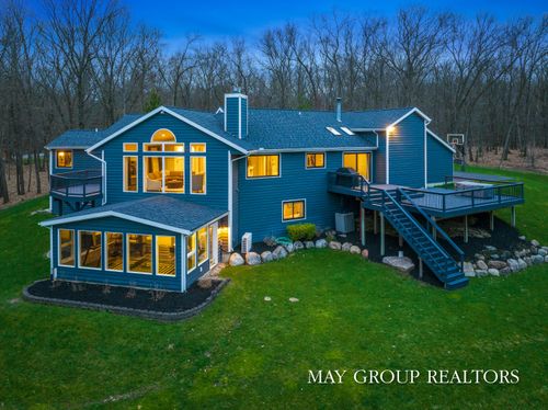 8355 Wilderness Trl Ne, Ada, MI, 49301-9703 | Card Image